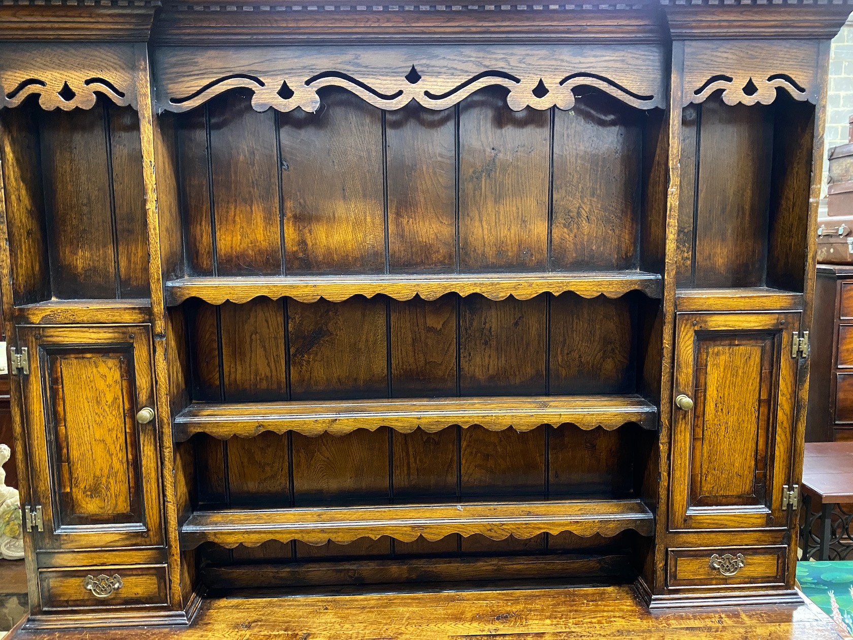 An 18th century style mahogany banded oak potboard dresser with boarded rack, width 167cm, depth 48cm, height 204cm